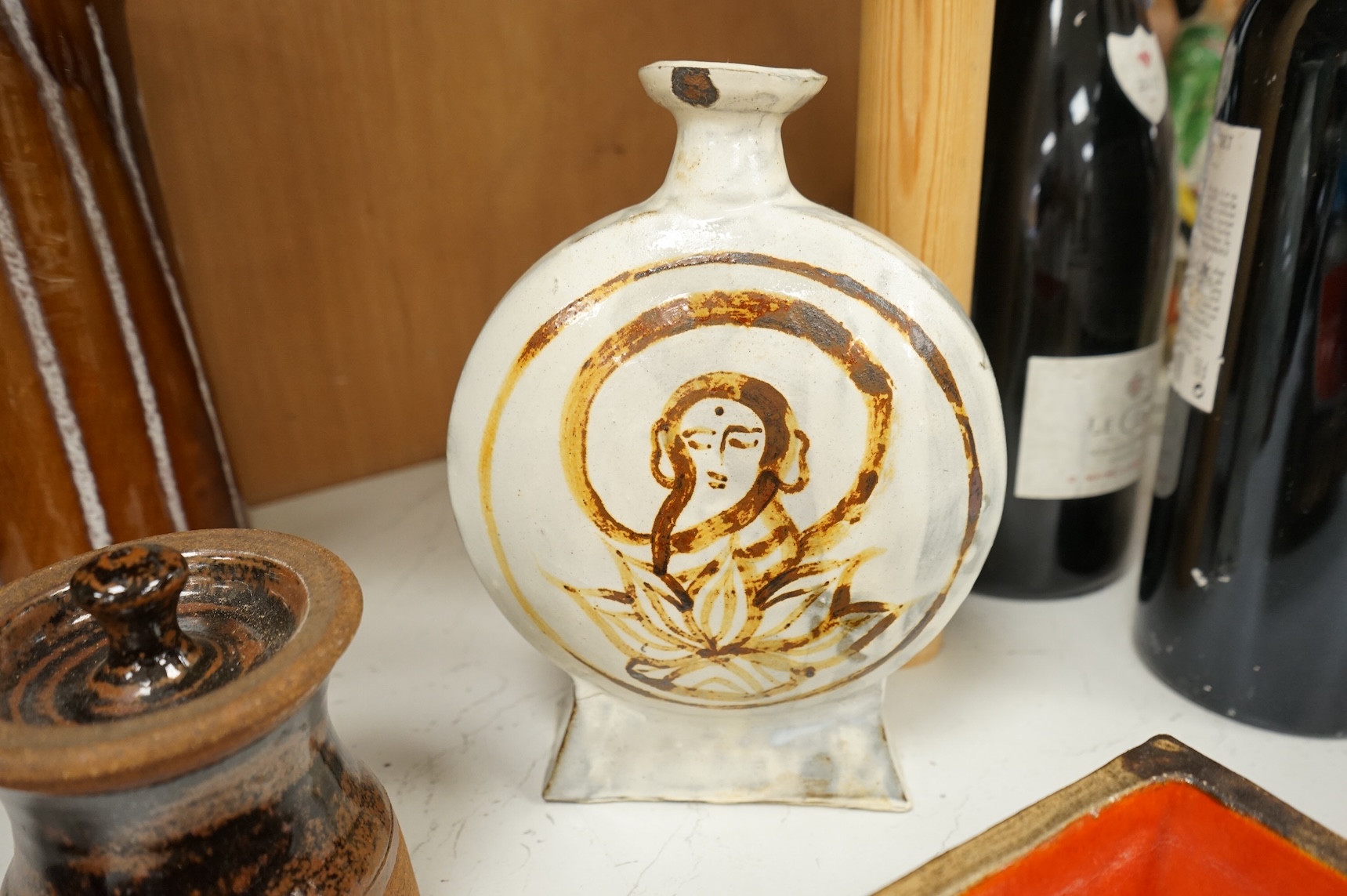 A group of eleven pieces of mixed 1960's-80's pottery to include vases, jugs and two rectangular dishes, largest 34cm high